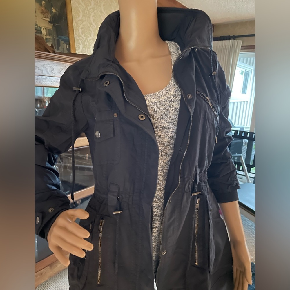 Navy blue windbreaker with hidden hood